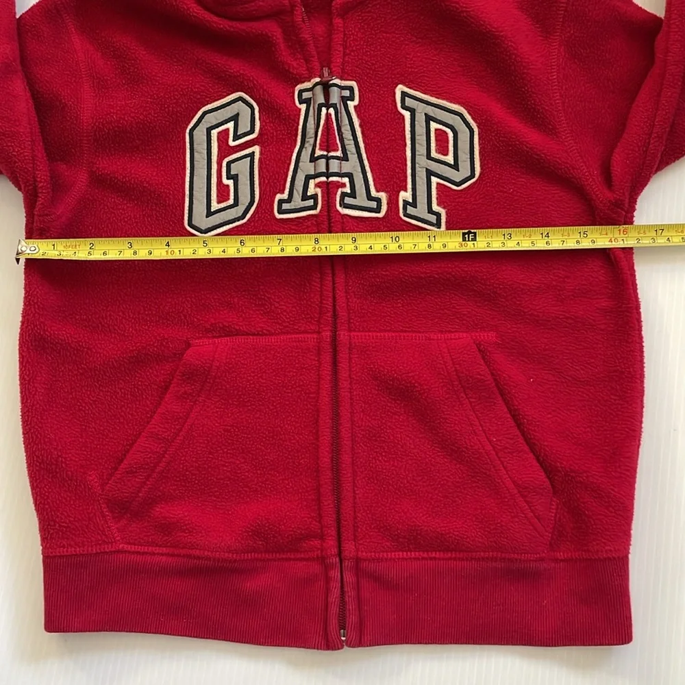 GapKids red hooded, full zip sweatshirt with gray, blue & white GAP.  Size small